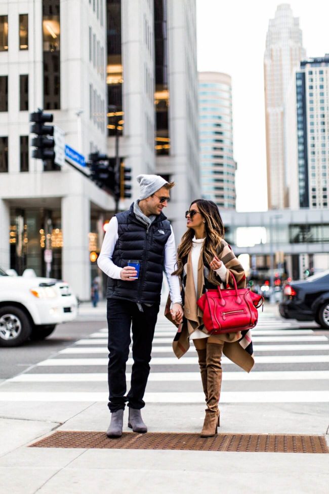 fashion blogger mia mia mine wearing a burberry cape and stuart weitzman over the knee boots from bloomingdale's