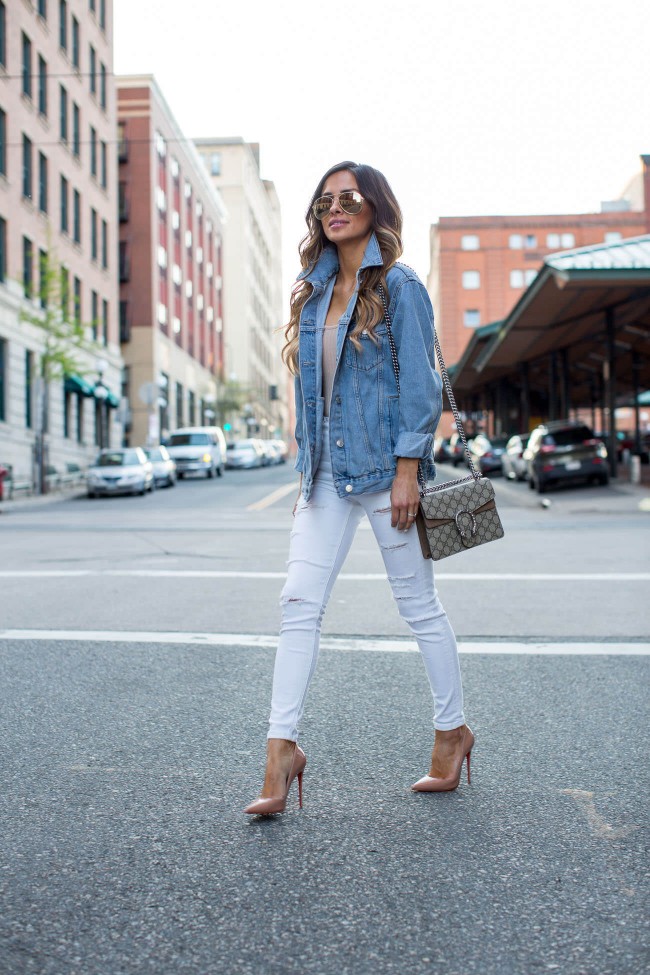 mia mia mine wearing a topshop denim jacket and louboutin heels