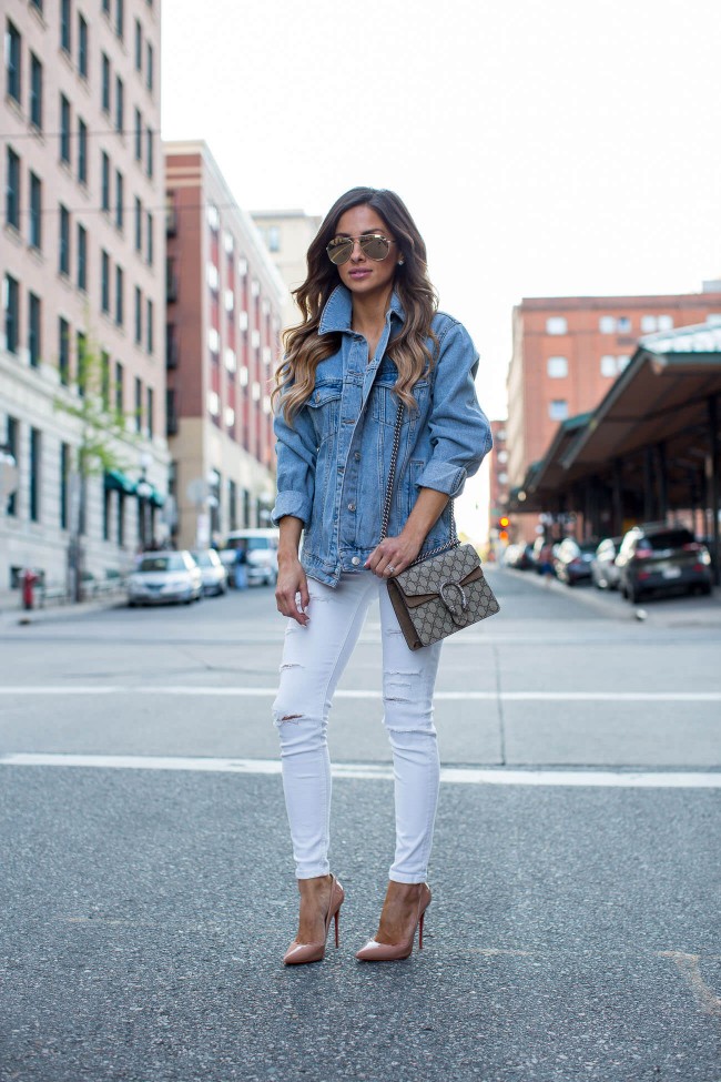 maria vizuete of mia mia mine wearing a denim jacket and topshop white jeans