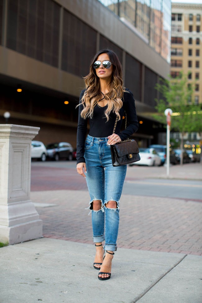 fashion blogger mia mia mine wearing a black bodysuit from shopbop