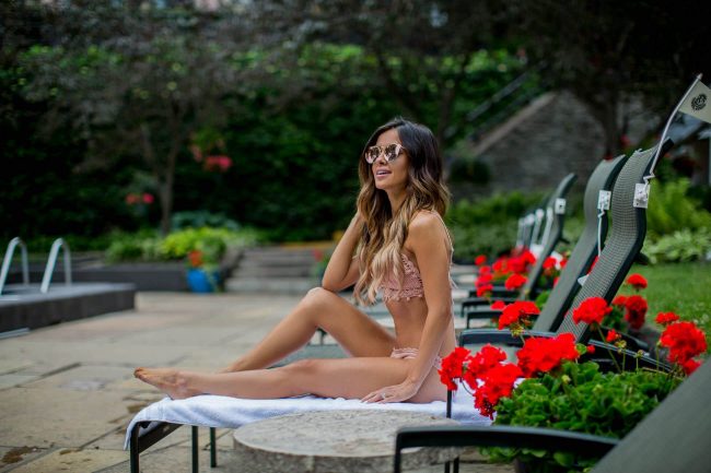 fashion blogger mia mia mine in a pink crochet bikini by somedays lovin at nordstrom
