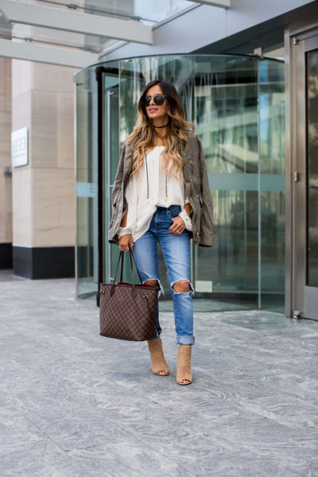 minneapolis fashion blogger mia mia mine wearing a white slit sleeve top by sanctuary and sam edelman booties