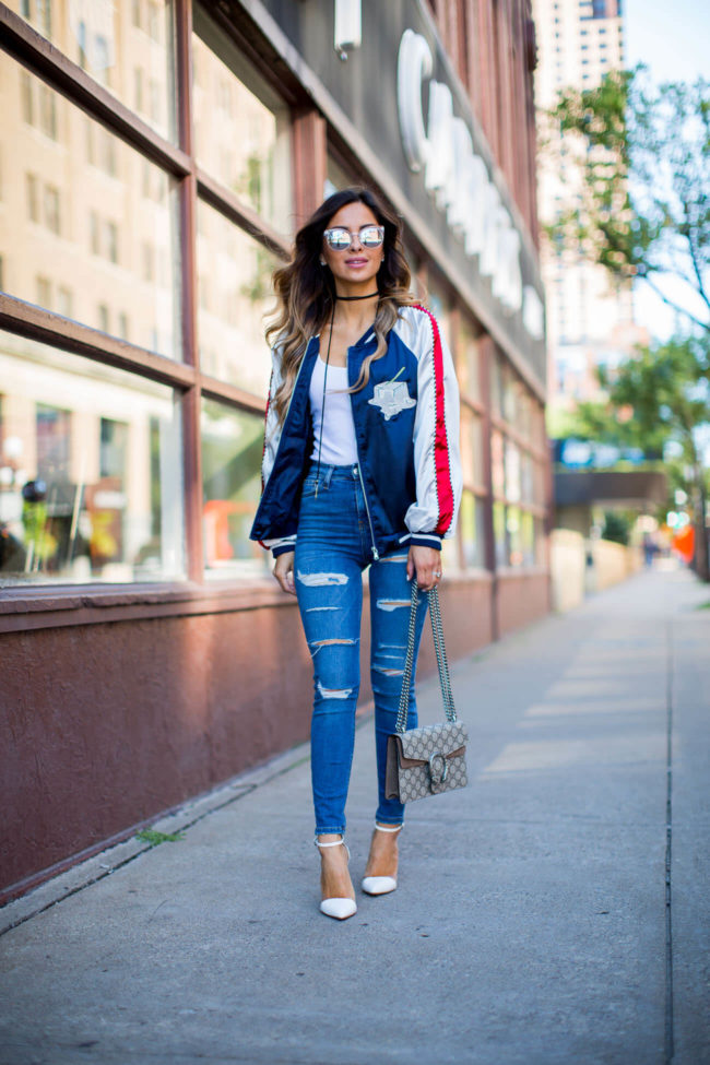 maria vizuete wearing a bomber jacket from storets and a vanessa mooney choker