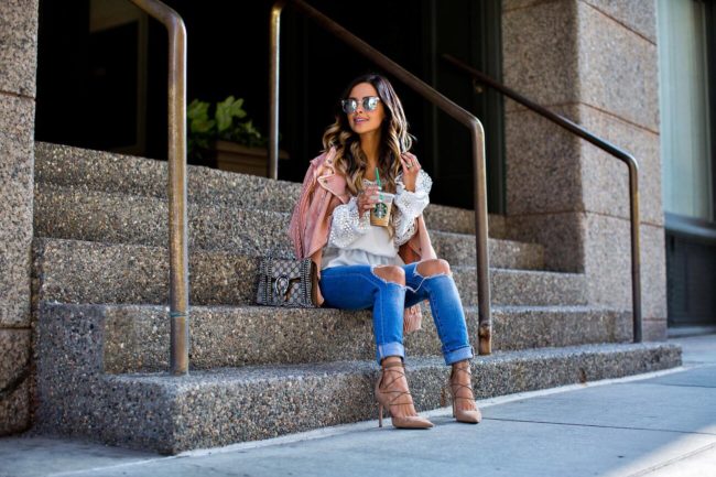 fashion blogger mia mia mine in a white lace off-the-shoulder top and sam edelman heels