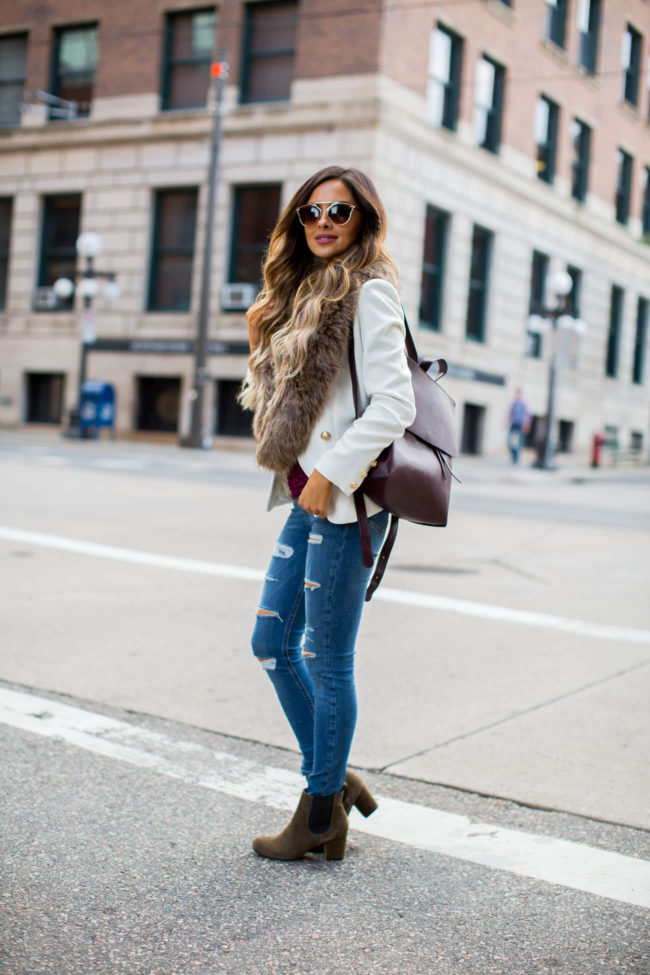 mia mia mine wearing 3 fall accessories by sole society