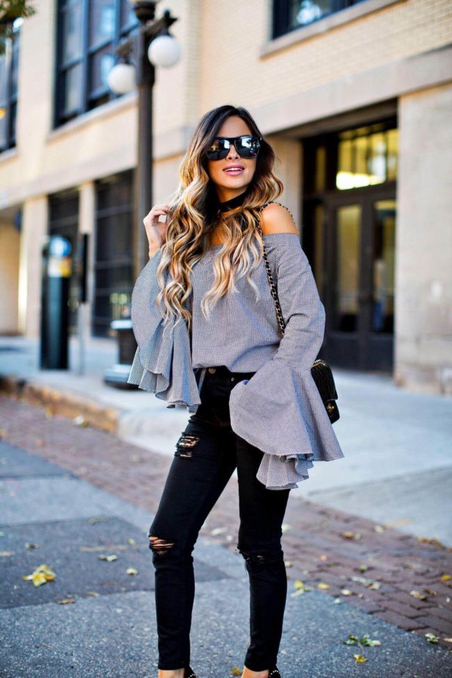 mia mia mine wearing a chicwish gingham top and black jeans