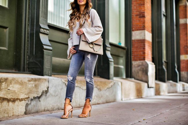 mia mia mine in grey jeans from express and a bell sleeve sweater