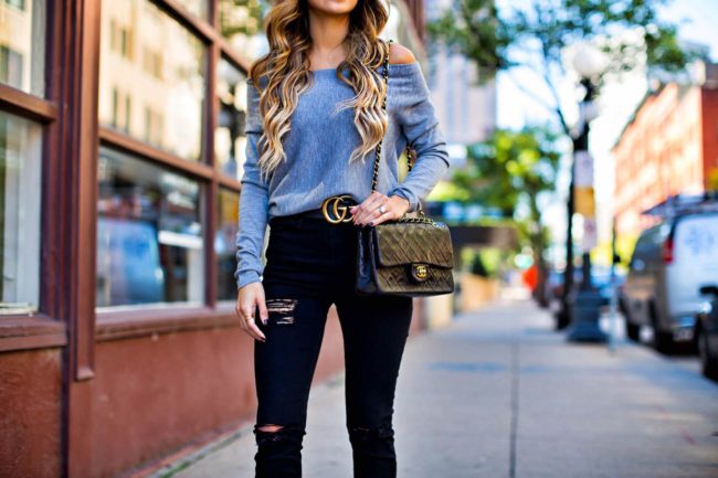 mia mia mine in a gucci double g buckle belt and black topshop jeans