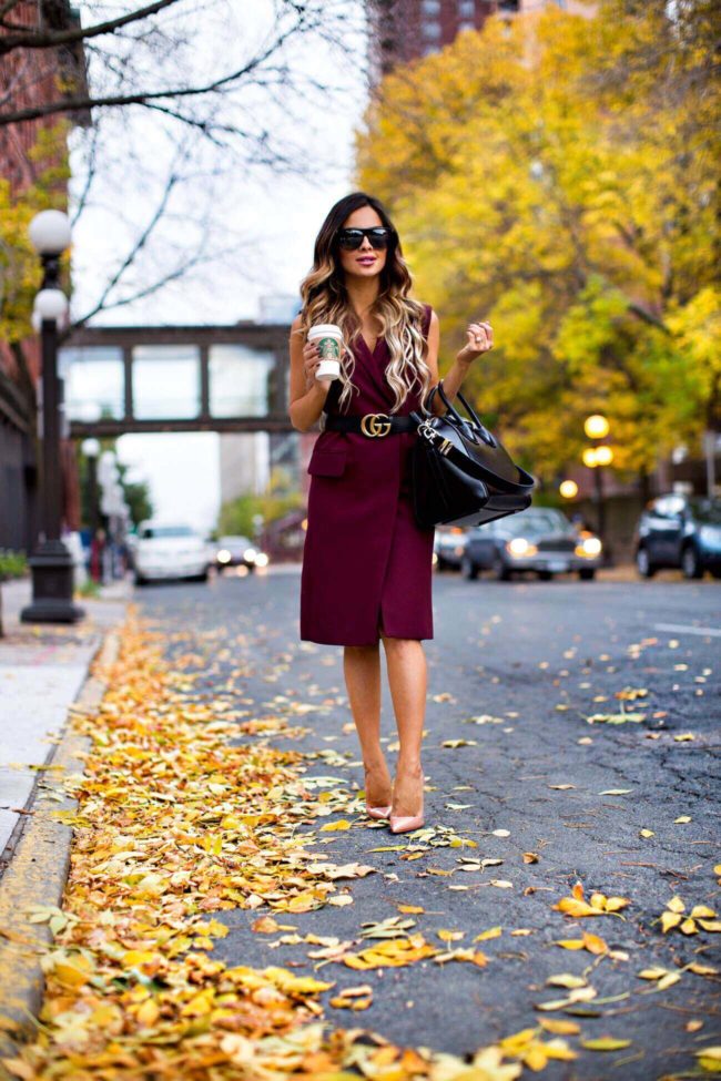 fashion blogger mia mia mine wearing a burgundy sleeveless blazer from nordstrom
