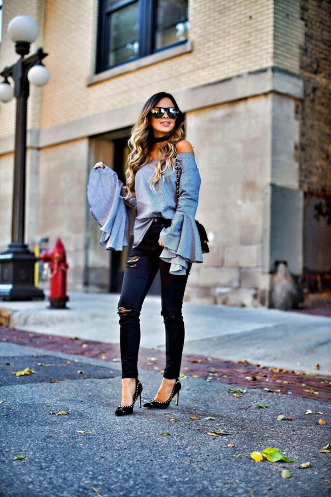 fashion blogger mia mia mine wearing a gingham bell sleeve top from chicwish