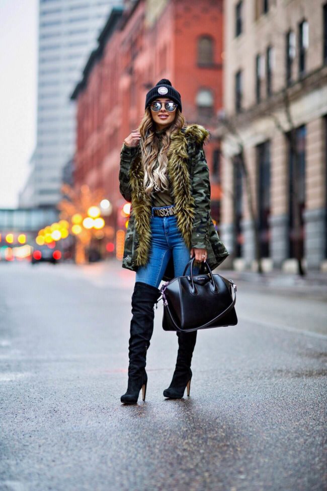 fashion blogger mia mia mine wear a camo winter coat and a black beanie