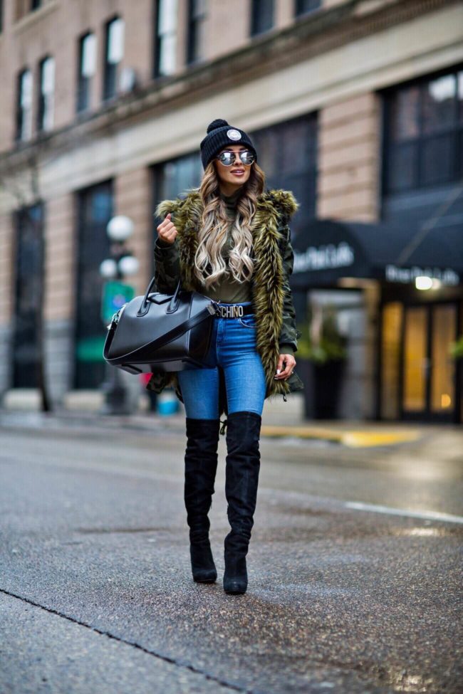 mn fashion blogger mia mia mine wearing a camo coat from nordstrom and a givenchy bag