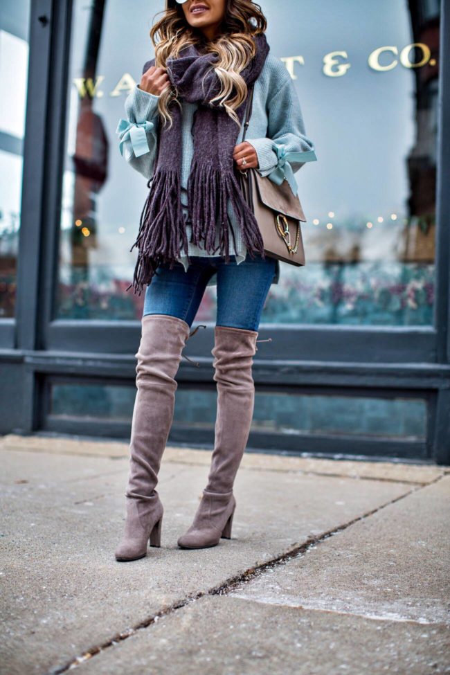 mia mia mine wearing stuart weitzman over-the-knee boots