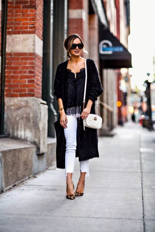 fashion blogger mia mia mine wearing a lace cami and a bb dakota cardigan from shopbop