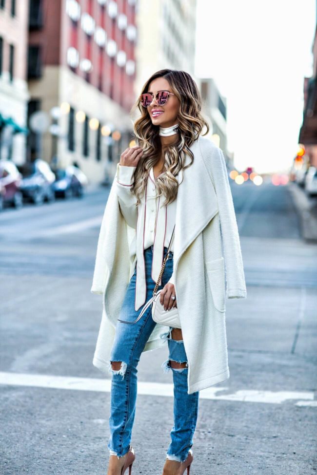 fashion blogger mia mia mine wearing a cream top for valentine's day