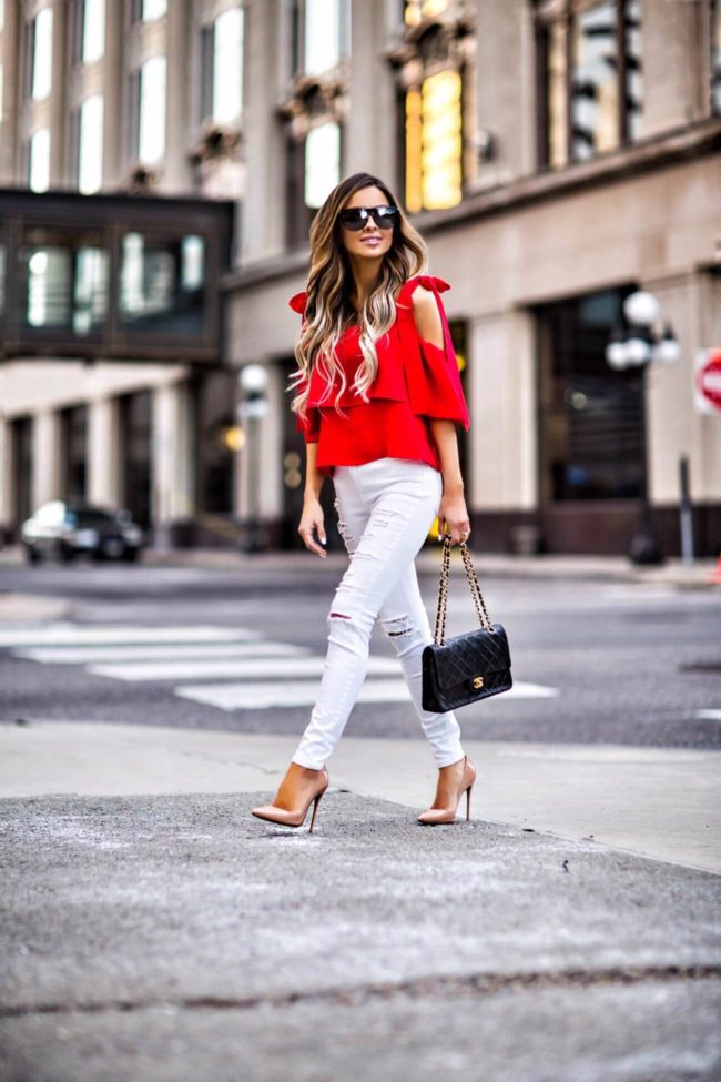 mn fashion blogger mia mia mine wearing a red bow shoulder top and christian louboutin so kate heels