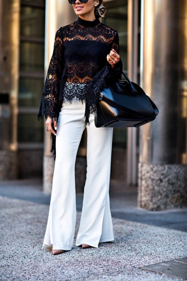 fashion blogger mia mia mine wearing a white lovers + friends white pants and a givenchy bag 