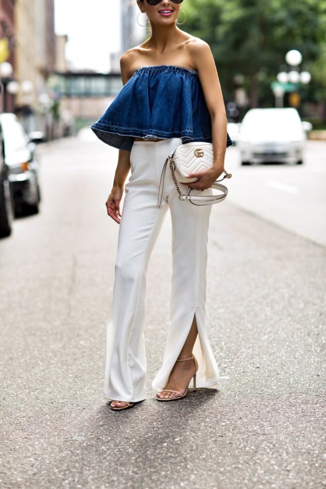 fashion blogger mia mia mine wearing white pants from revolve and a gucci marmont bag