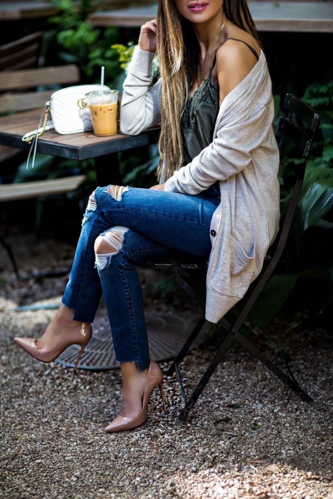 fashion blogger mia mia mine wearing christian louboutin heels and an abercrombie sweater