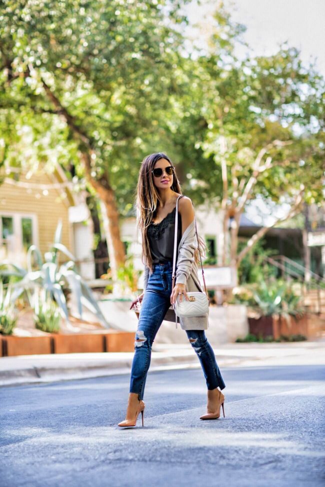 fashion blogger mia mia mine wearing an abercrombie sweater and a gucci marmont bag
