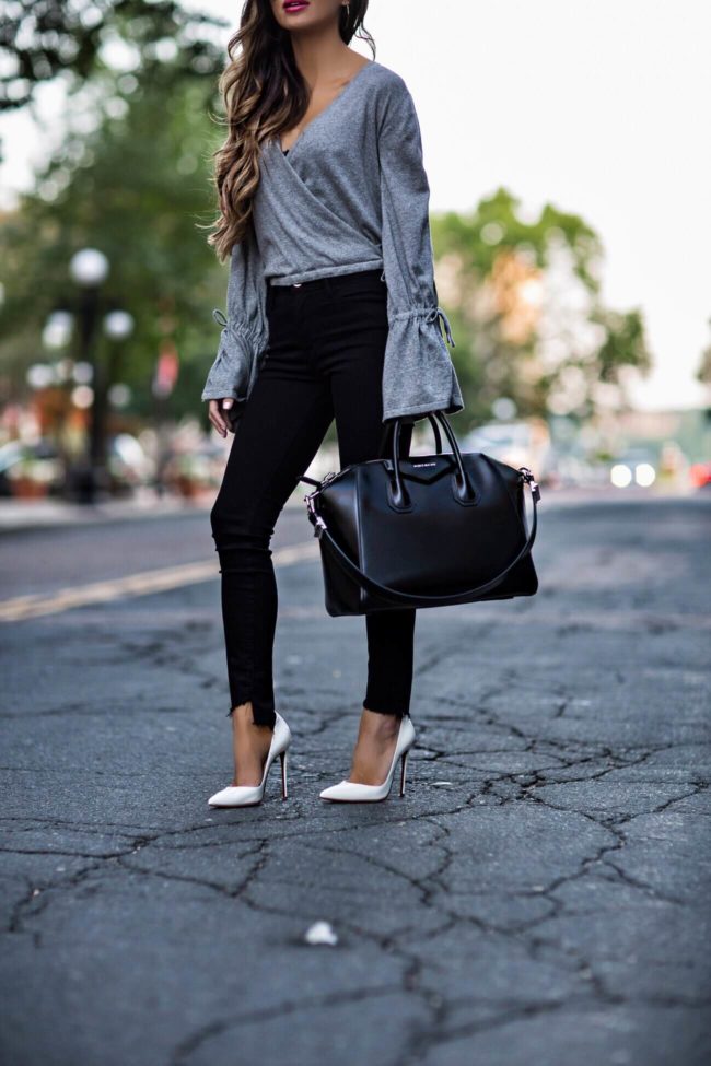 Raw hem Frame black skinny jeans, bell sleeve Minkpink top, white heels