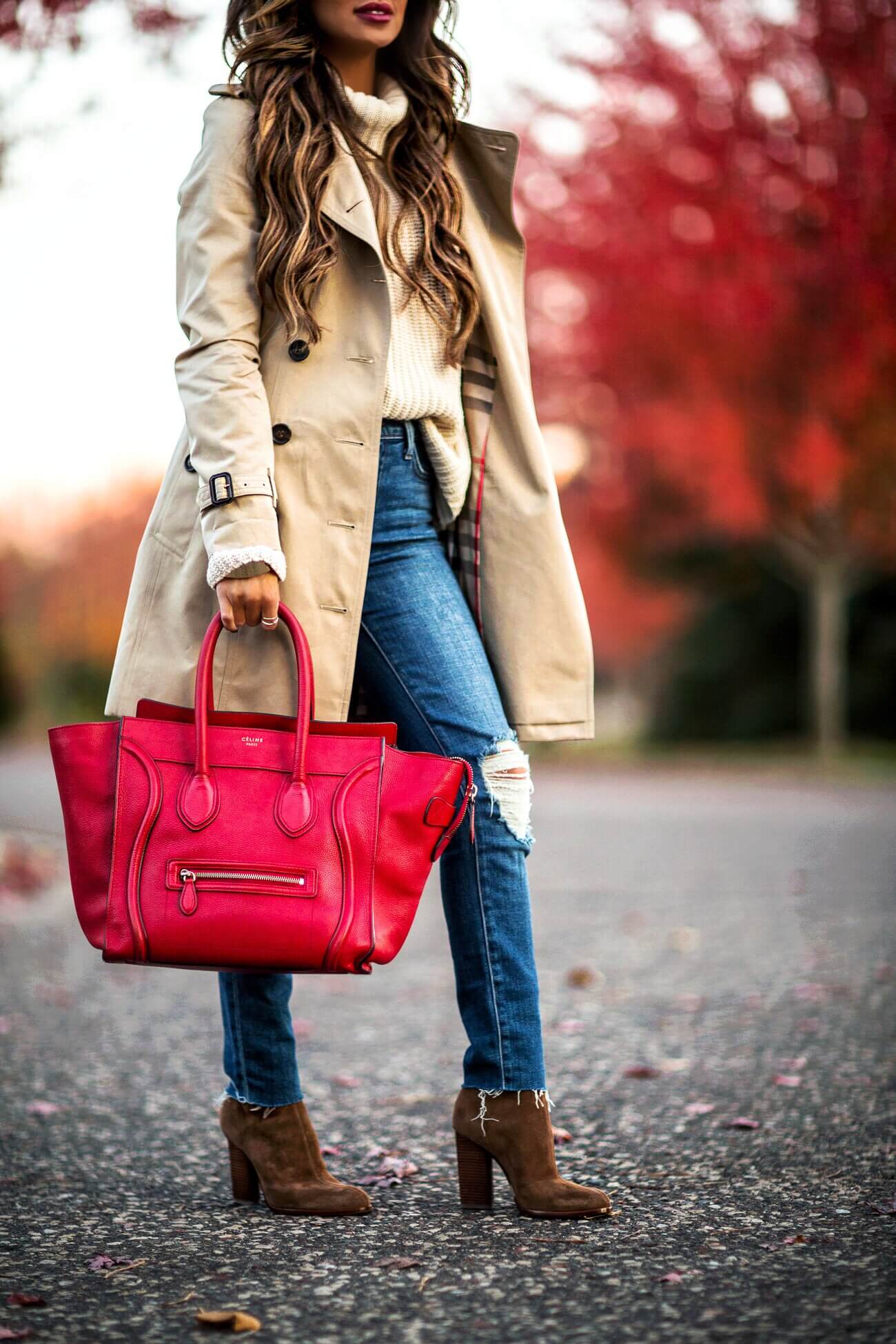 fashion blogger mia mia mine wearing a red celine bag and alexander wang booties
