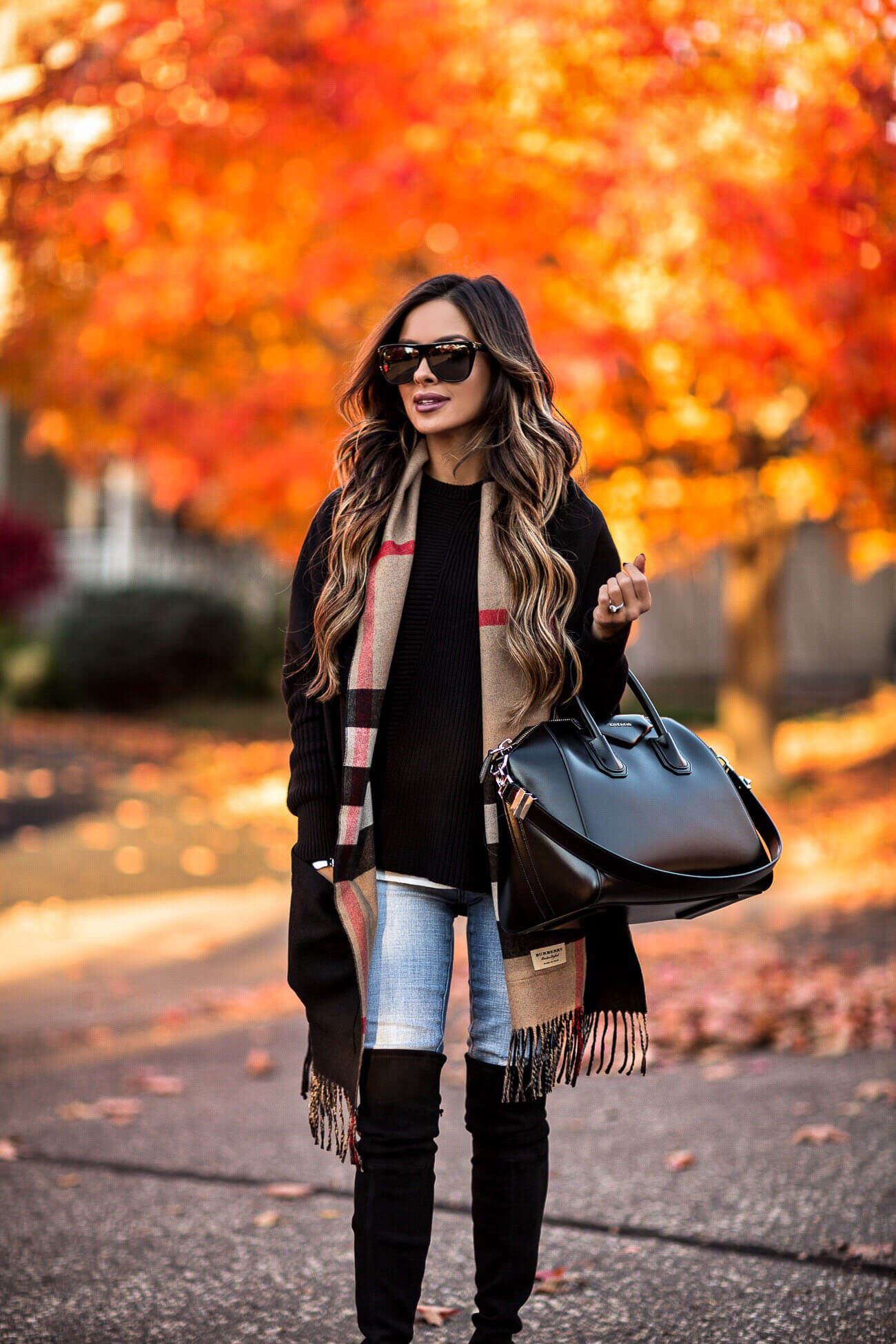 mia mia mine wearing a burberry scarf and a givenchy antigona bag