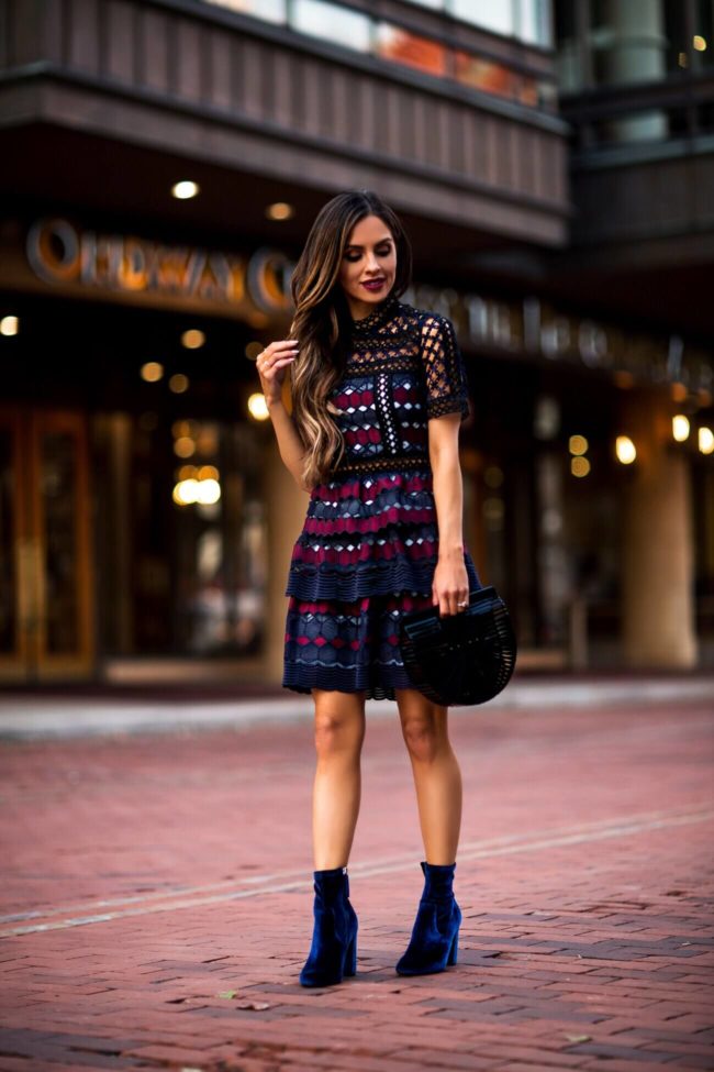 mia mia mine wearing a self portrait lace dress for christmas