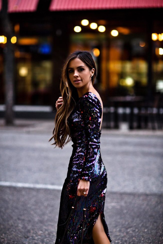 fashion blogger mia mia mine wearing a sparkly holiday dress