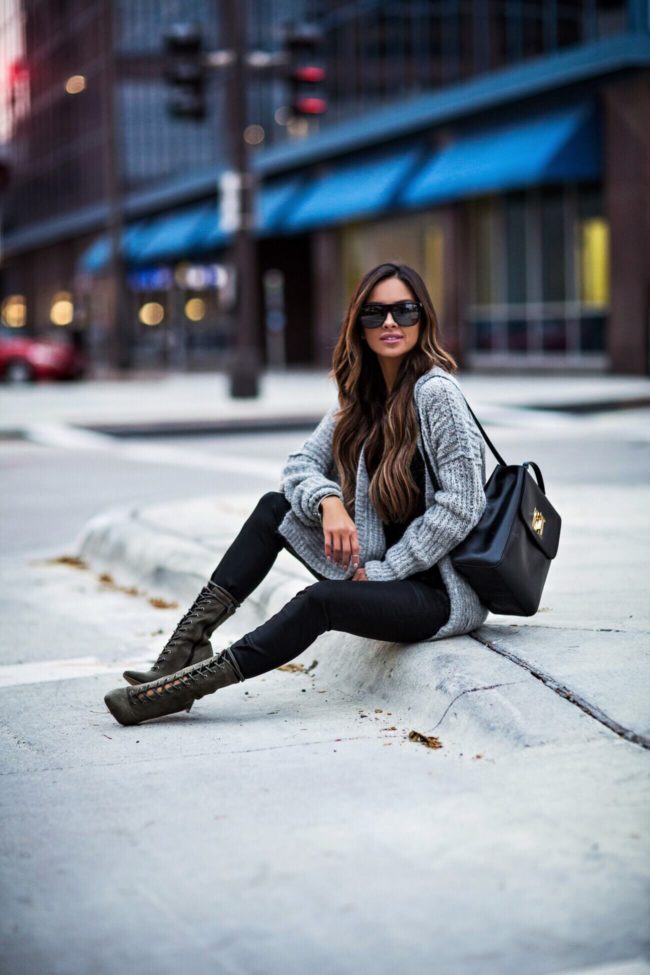mia mia mine wearing olive lace up booties by steve madden