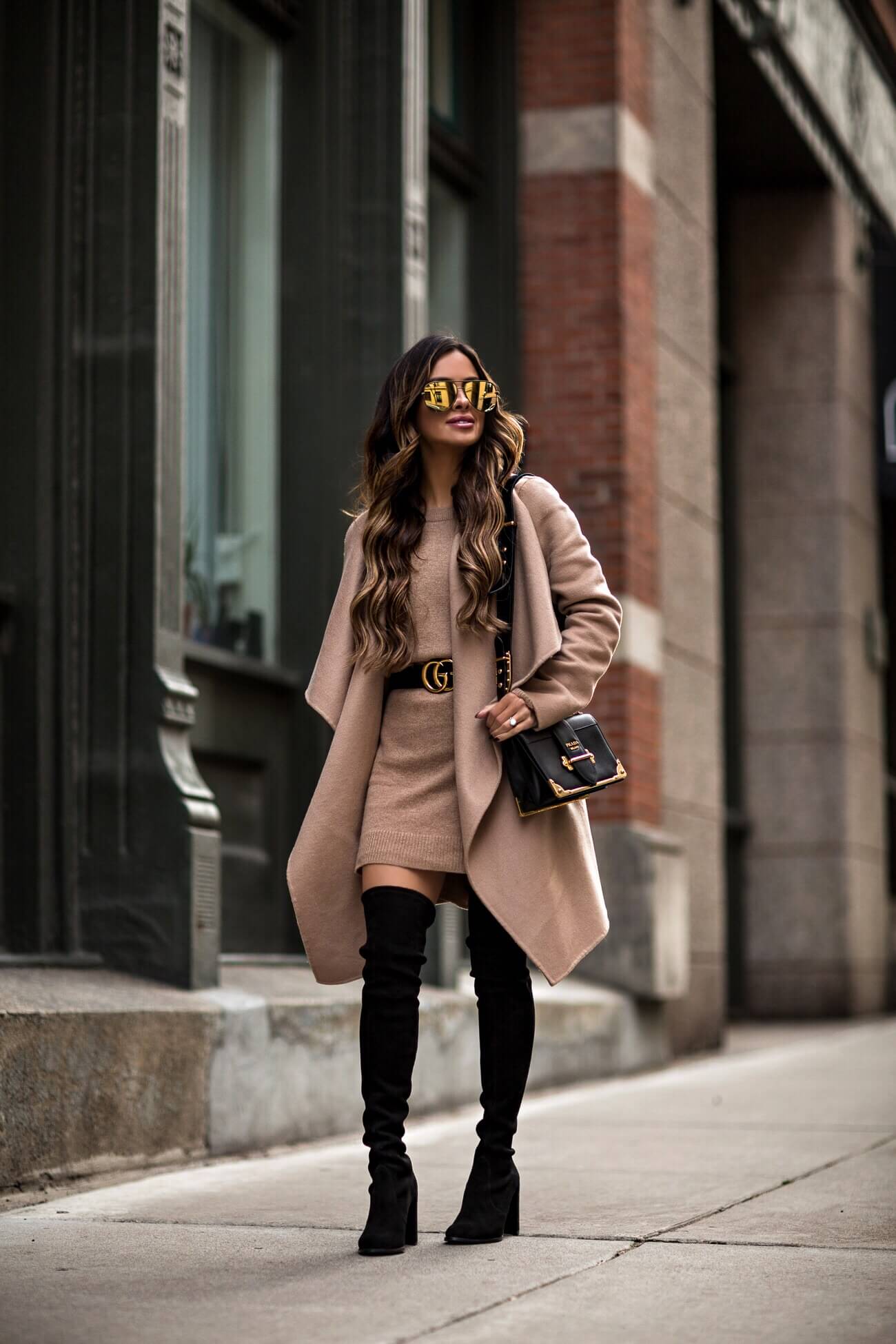 fashion blogger mia mia mine wearing a prada cahier bag and stuart weitzman over the knee boots