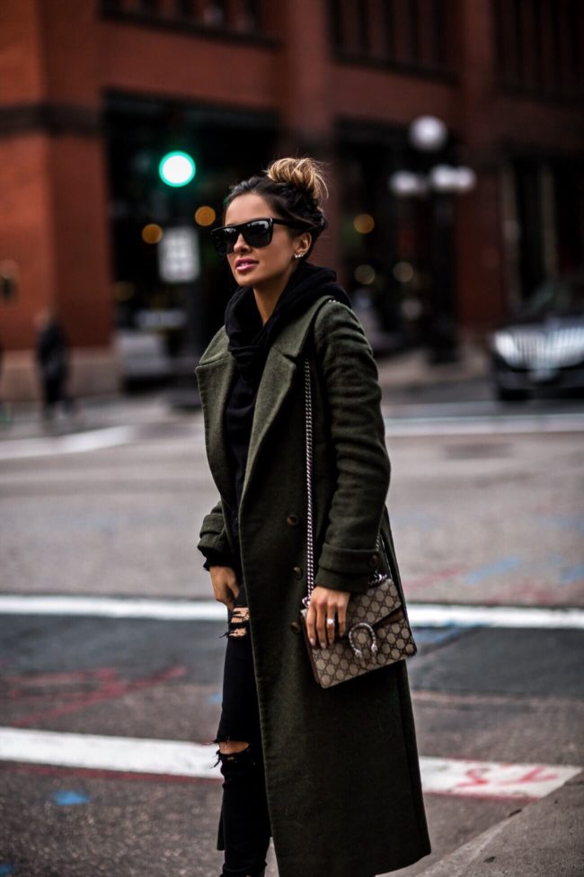 fashion blogger mia mia mine wearing a green trench coat from asos