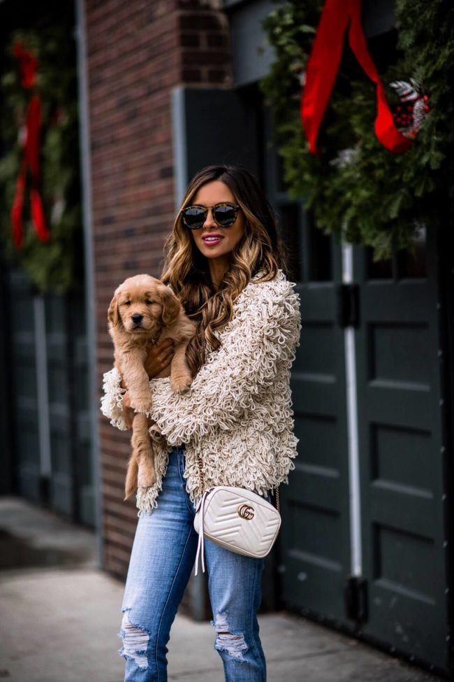 fashion blogger mia mia mine wearing a shag loop cardigan and a gucci marmont bag