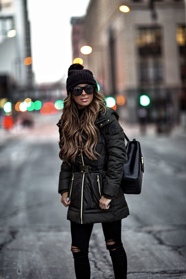 fashion blogger mia mia mine wearing a green parka from macy's