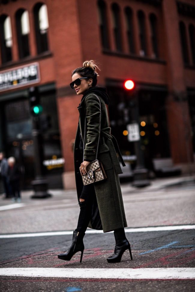 fashion blogger mia mia mine wearing black jimmy choo booties from elevtd