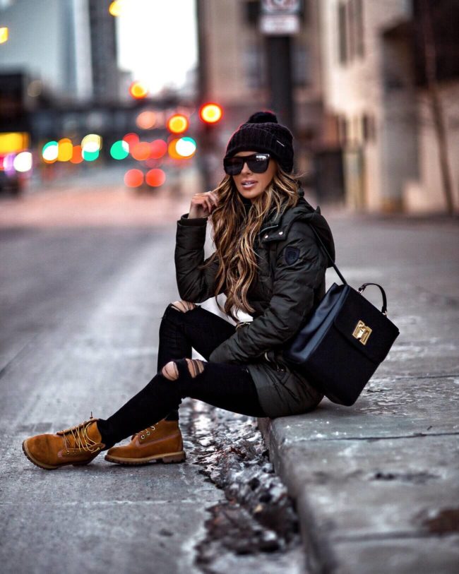 mia mia mine wearing an olive parka from macy's and timberland boots
