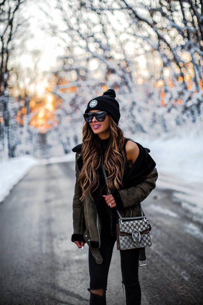 fashion blogger mia mia mine wearing celine sunglasses and a gucci dionysus