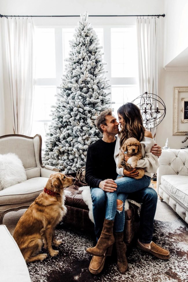 fashion blogger mia mia mine with husband phil thompson and golden retriever puppies