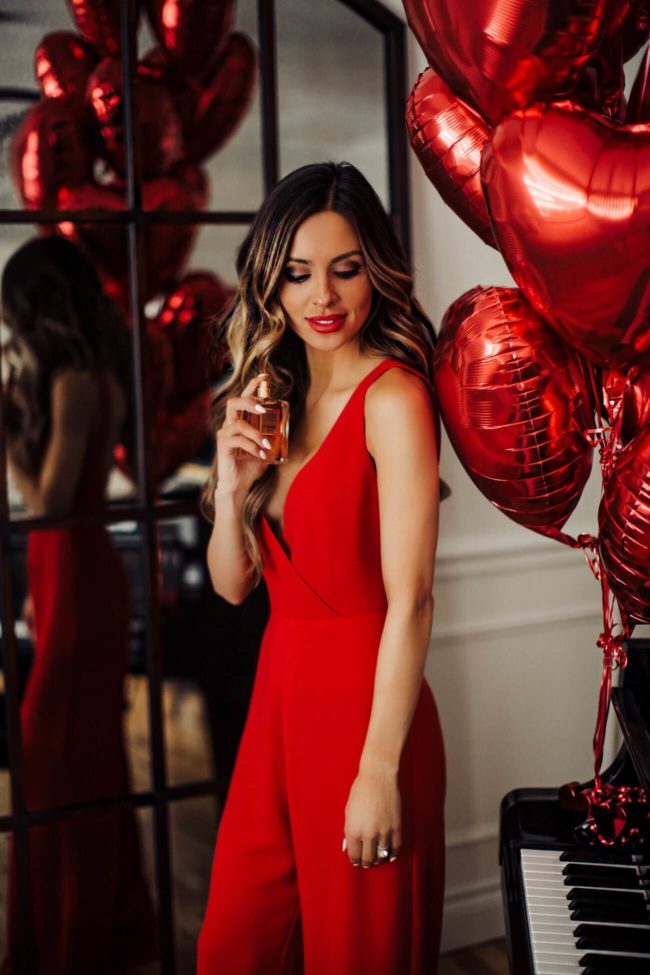 fashion blogger mia mia mine wearing a red v-neck romper from nordstrom