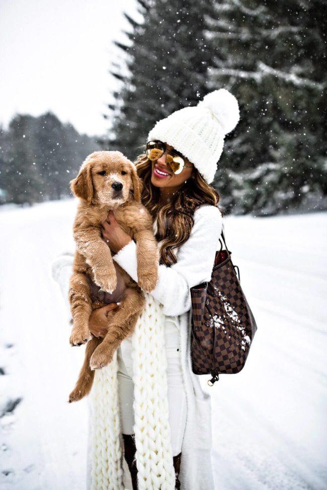 fashion blogger mia mia mine wearing a white willow + clay sweater and free people beanie