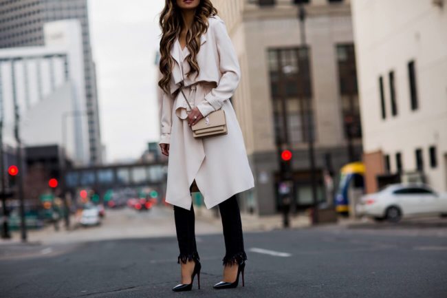 fashion blogger mia mia mine wearing black christian louboutin heels and fringe free people denim from nordstrom