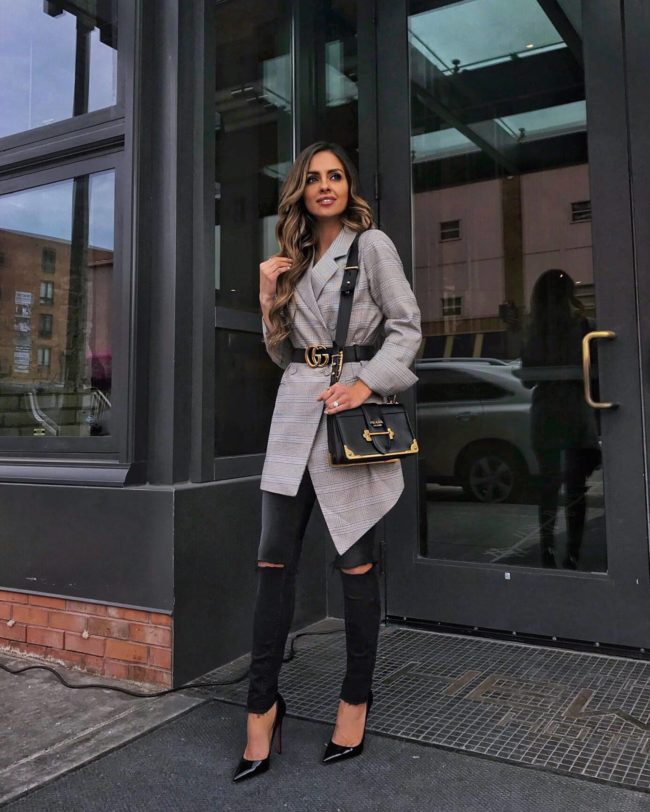 mia mia mine wearing a checkered blazer and gucci belt
