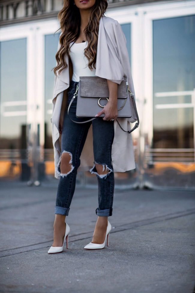 fashion blogger mia mia mine wearing white christian louboutin so kate heels and a pink trench coat for spring