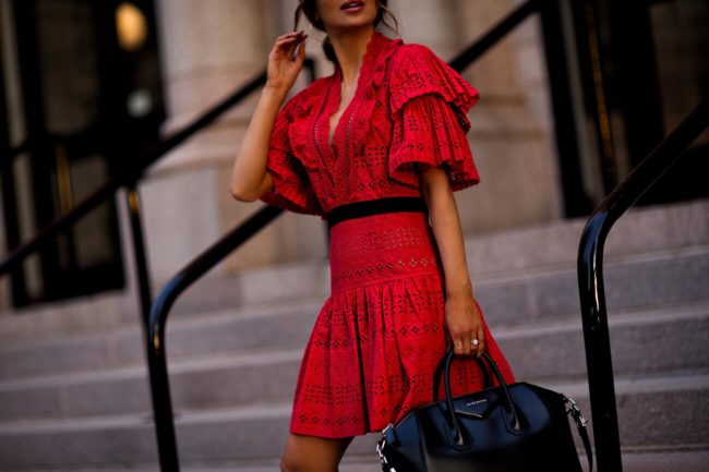 fashion blogger mia mia mine wearing a red lace self portrait dress from harvey nichols