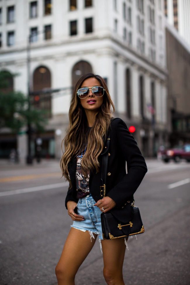 fashion blogger mia mia mine wearing quay sunglasses and a prada cahier bag