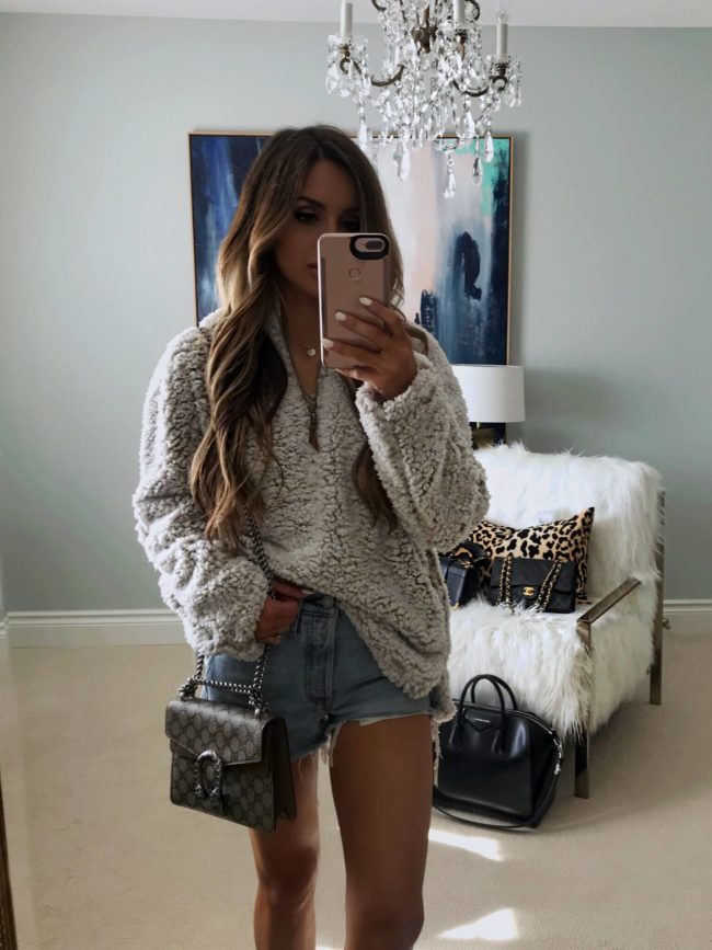 fashion blogger mia mia mine wearing a fleece pullover from the nordstrom anniversary sale 2018