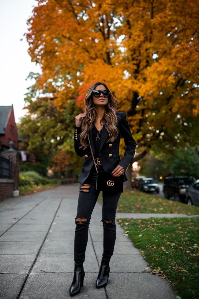 fashion blogger mia mia mine wearing a gucci belt and a gucci marmont velvet bag