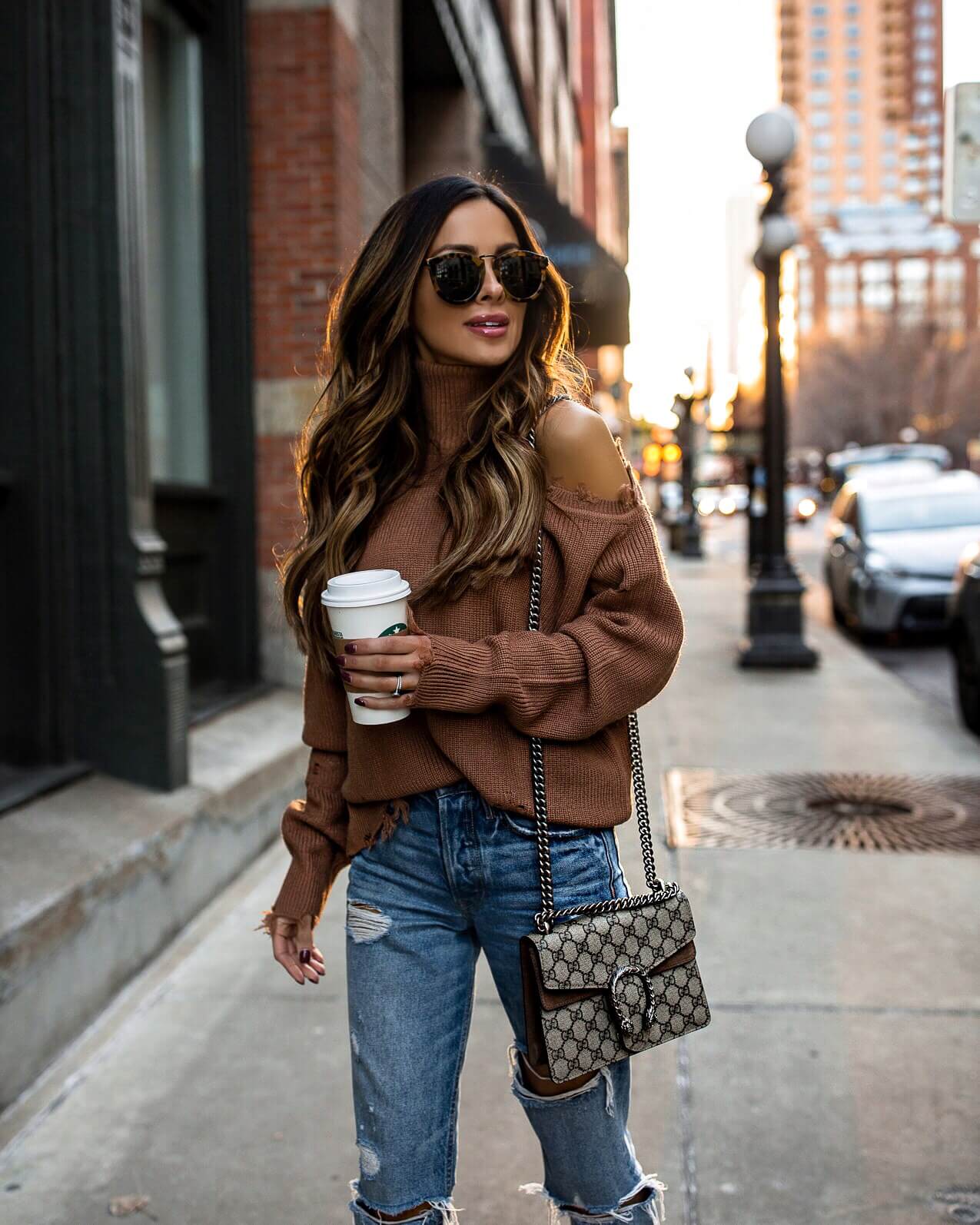 fashion blogger mia mia mine wearing an orange turtleneck from revolve and a gucci dionysus mini bag