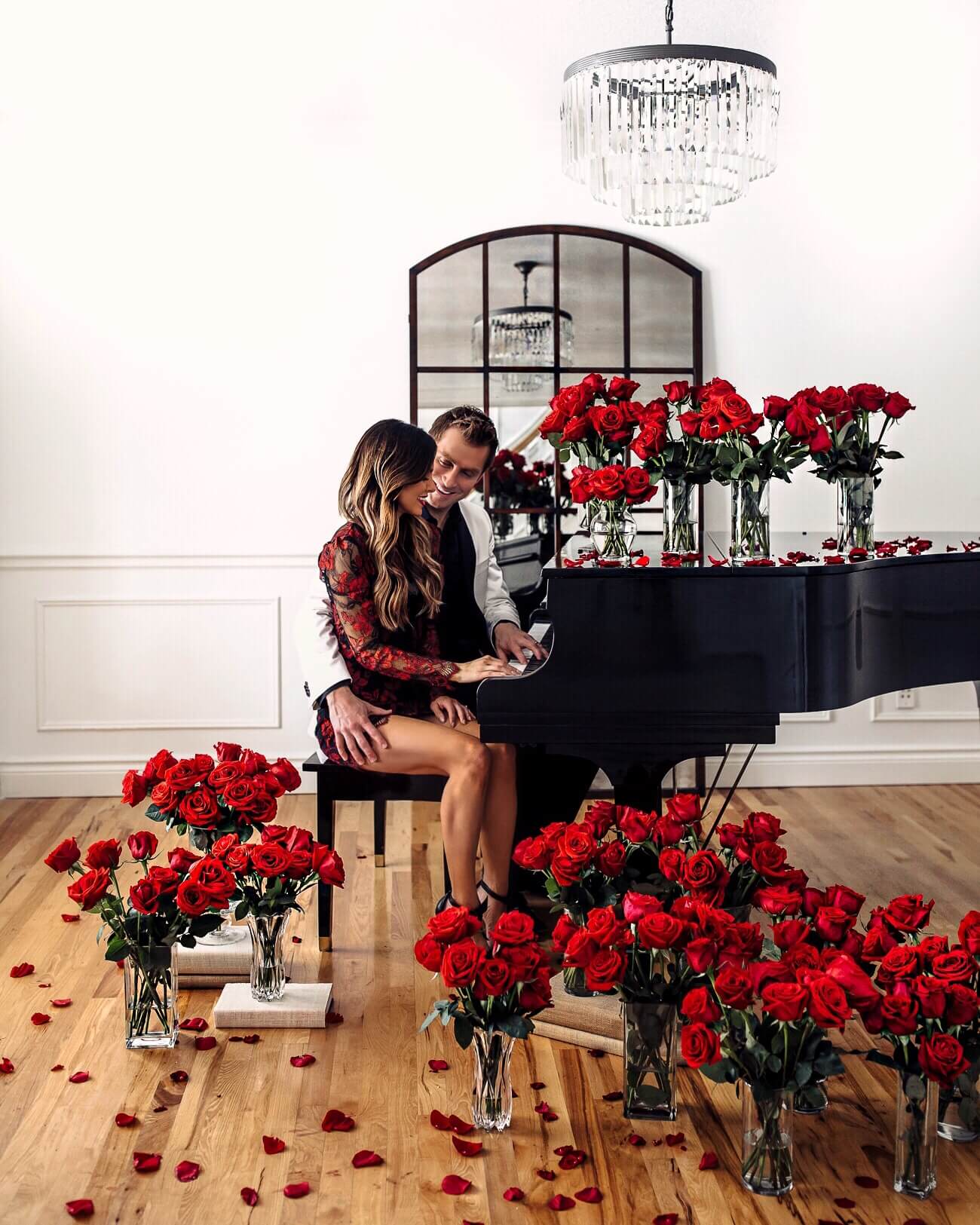fashion blogger mia mia mine wearing a rose dress from revolve for valentine's day