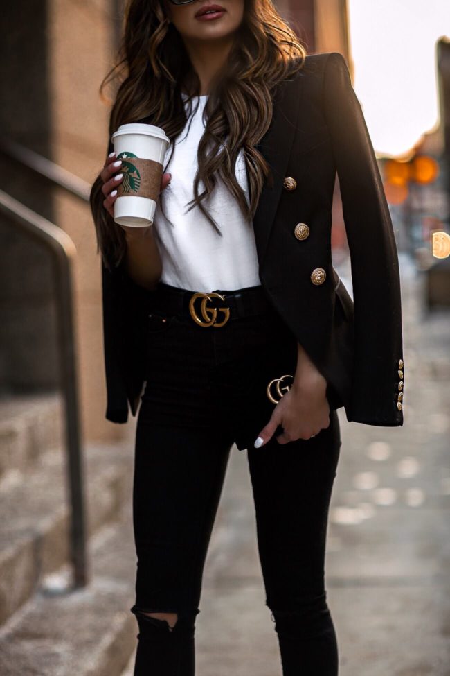 fashion blogger mia mia mine wearing a balmain blazer and a gucci belt